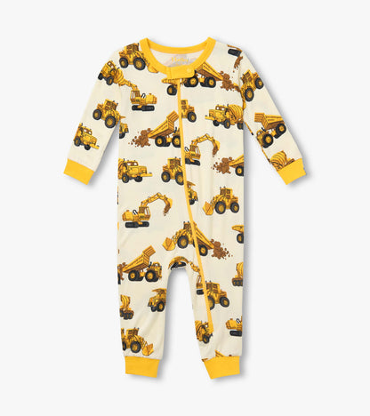 Front view of infant coverall with yellow trim, zip front, and yellow construction truck print