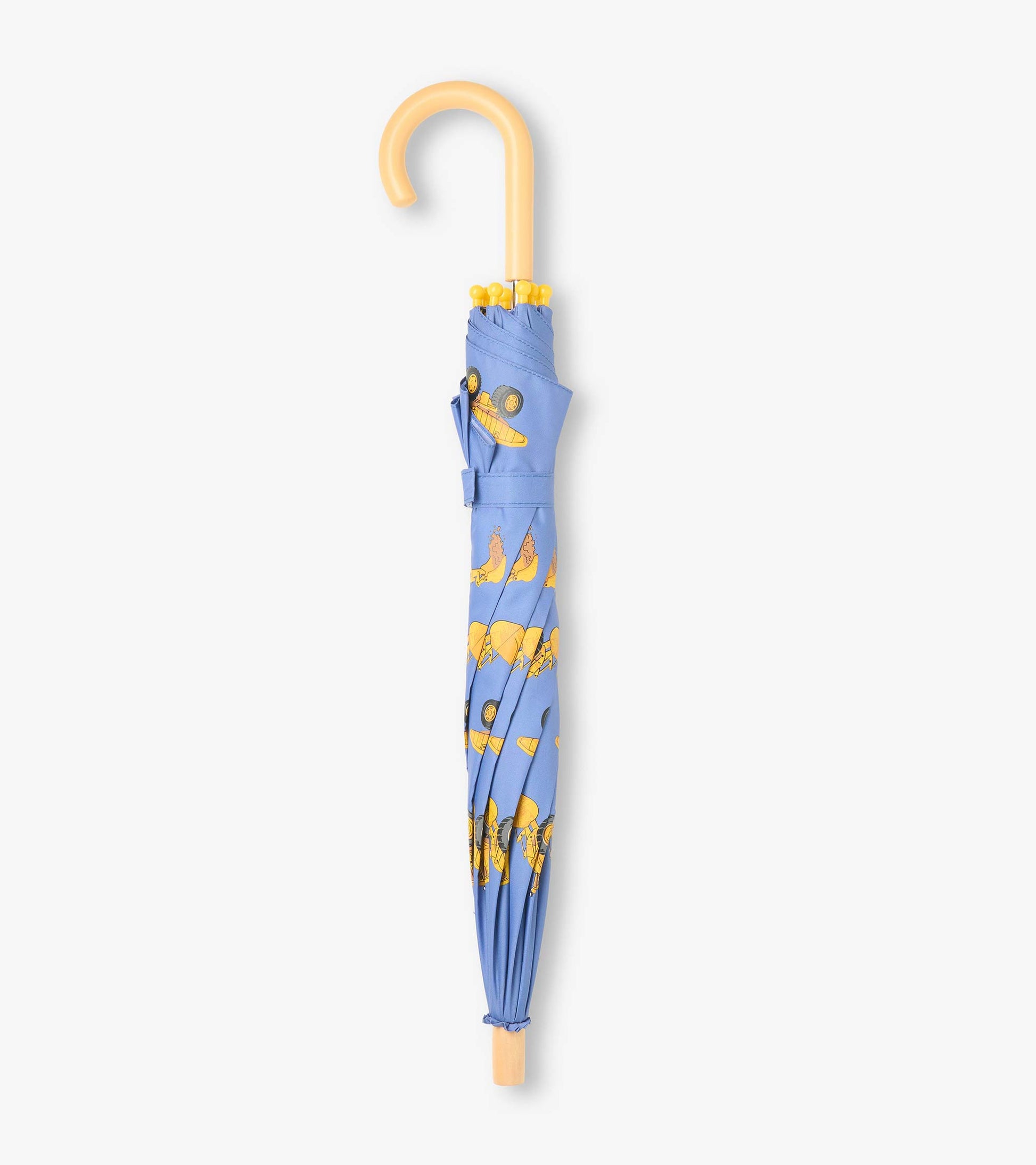 Closed blue umbrella with yellow construction truck print and curved light wood-tone handle