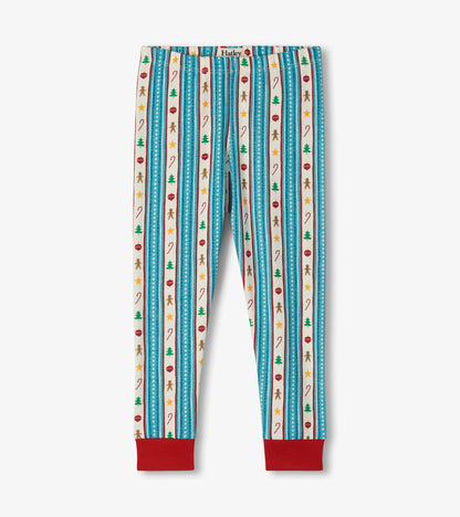 Kids pajama pants with red ankle cuffs and blue striped holiday print with gingerbread men, trees, and candy canes