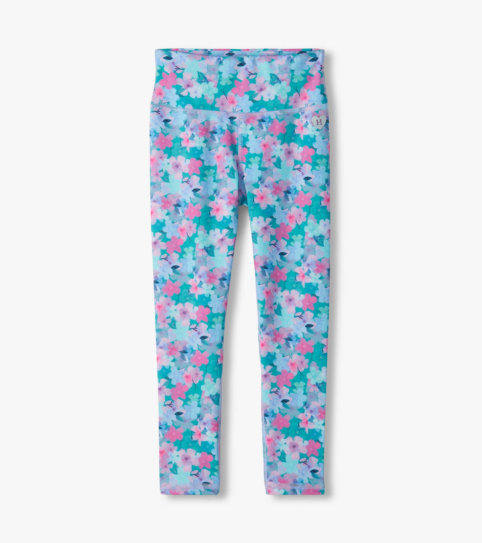 Kids floral active leggings with teal background, pink and light blue flowers, and a wide waistband
