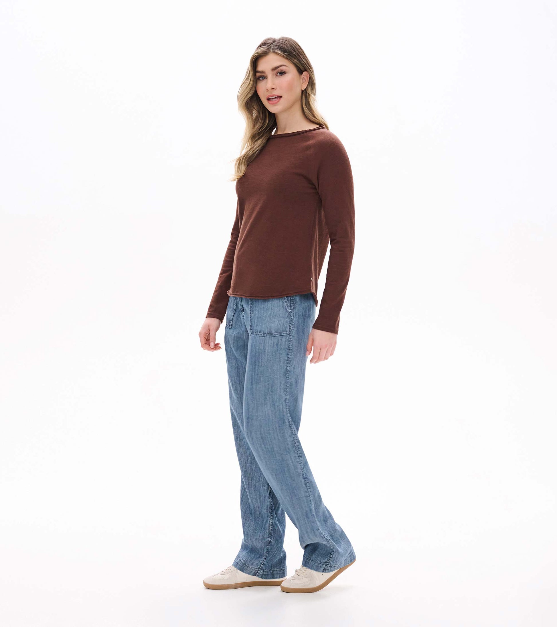Side front view of fondue fudge brown raglan sleeve tee with long sleeves and wide neckline