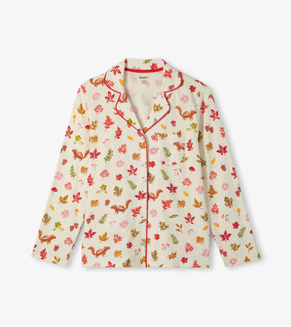 Pajama top with red piping, chest pocket, and fall print with leaves, acorns, mushrooms, and squirrels