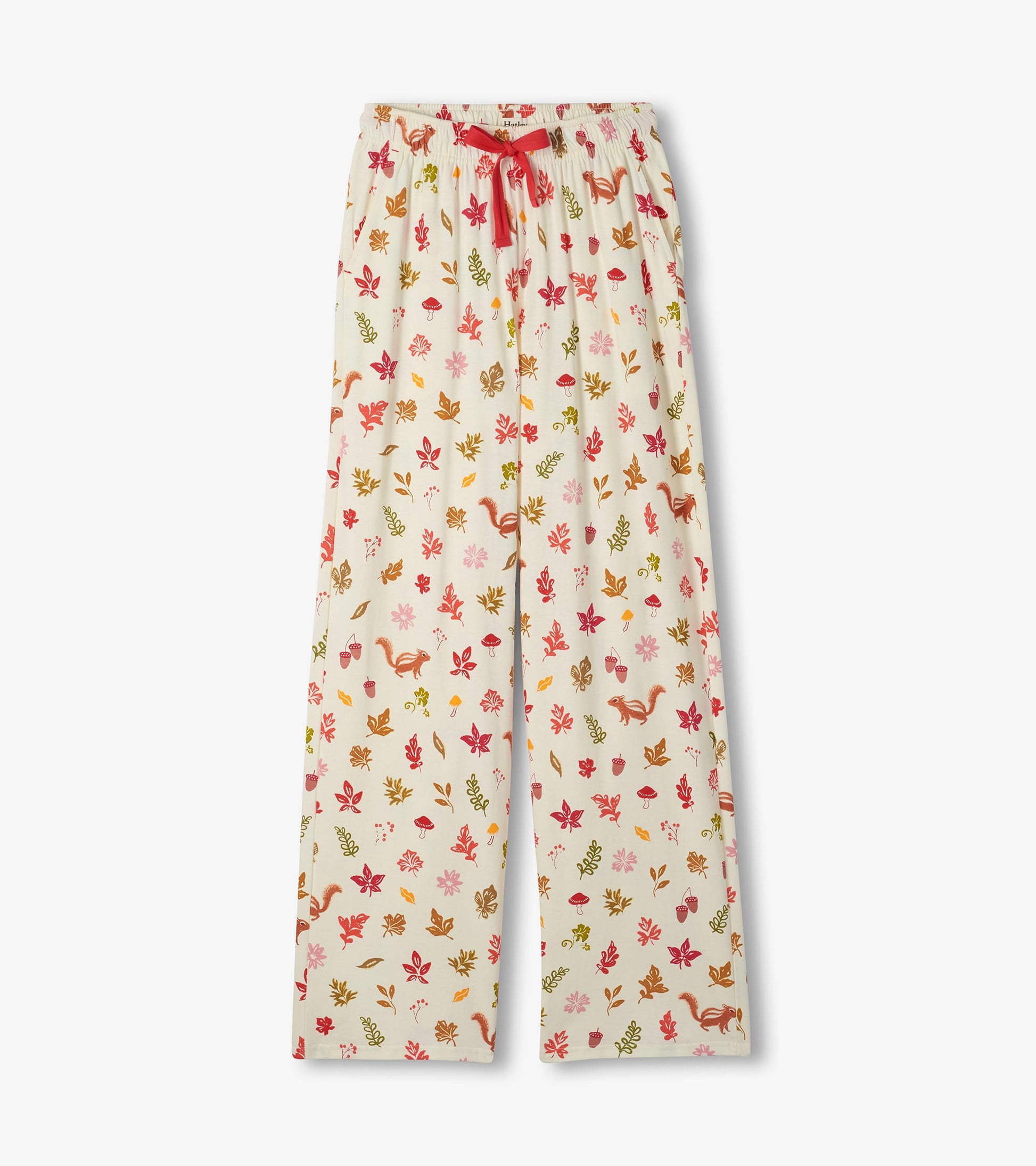 Pajama pants with red drawstring and fall print with leaves, acorns, mushrooms, and squirrels