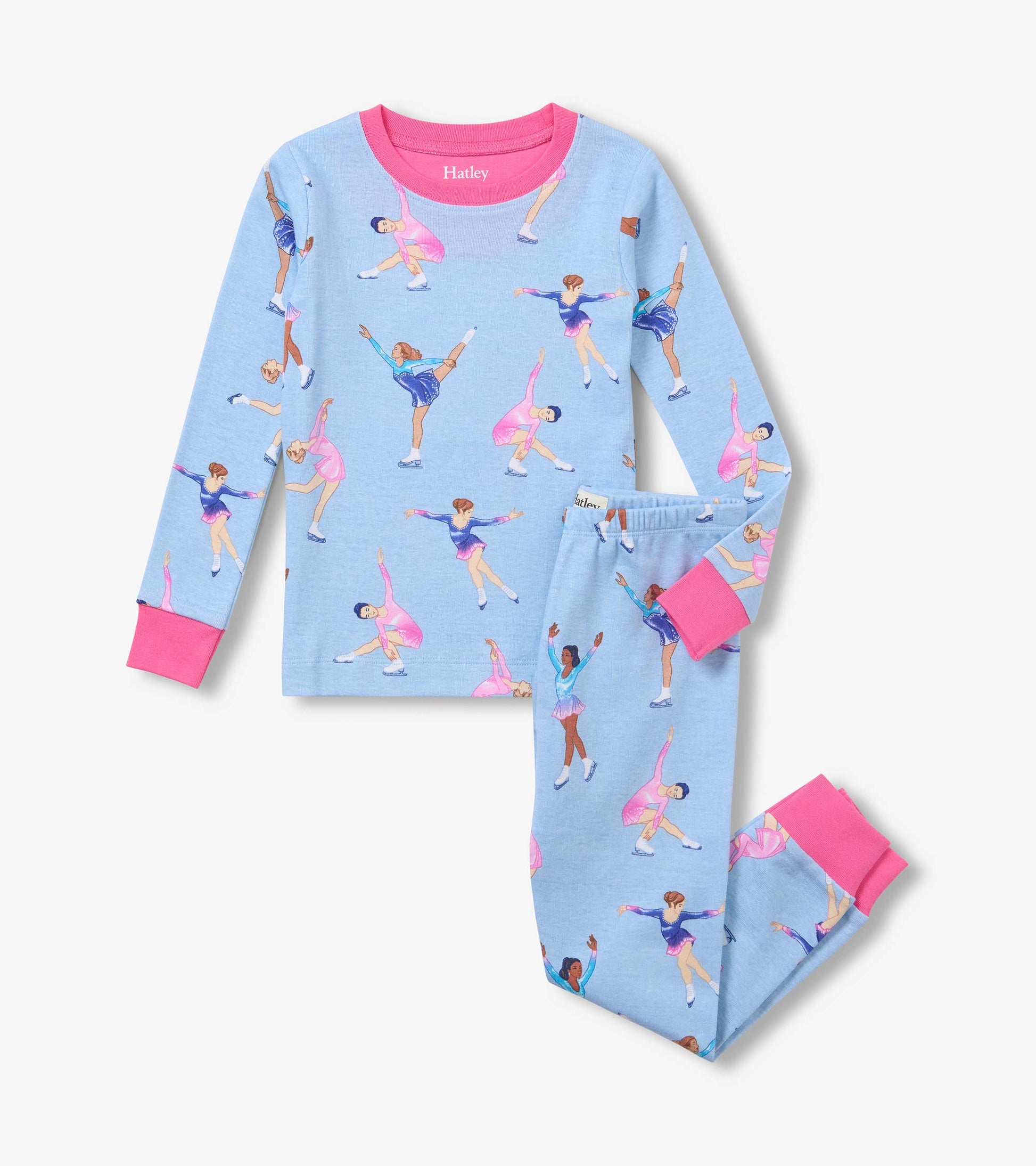 Kids pajama set in light blue with figure skater print and bright pink ribbed cuffs and neckline