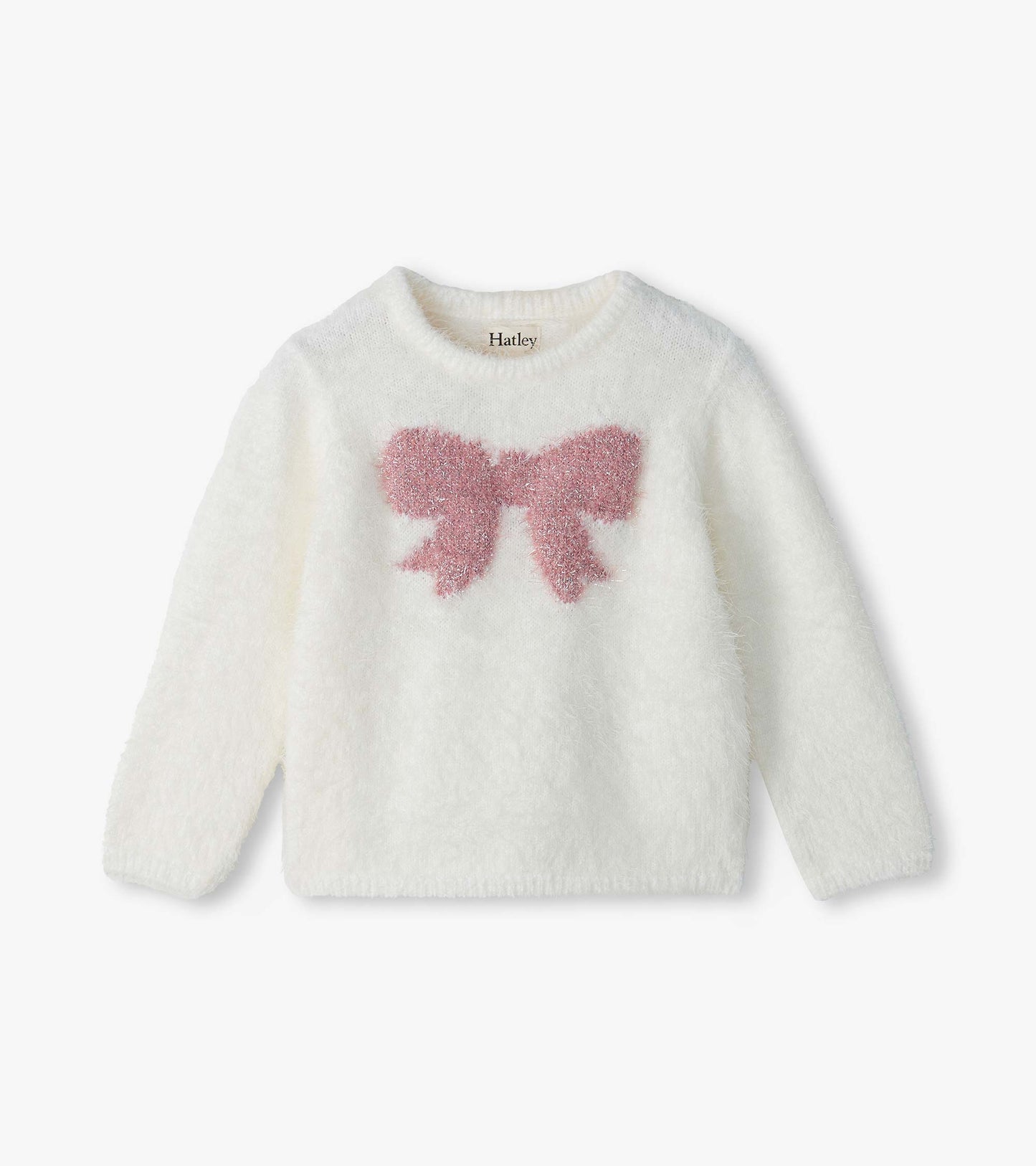 Infant fuzzy white sweater with long sleeves and a pink bow on the front