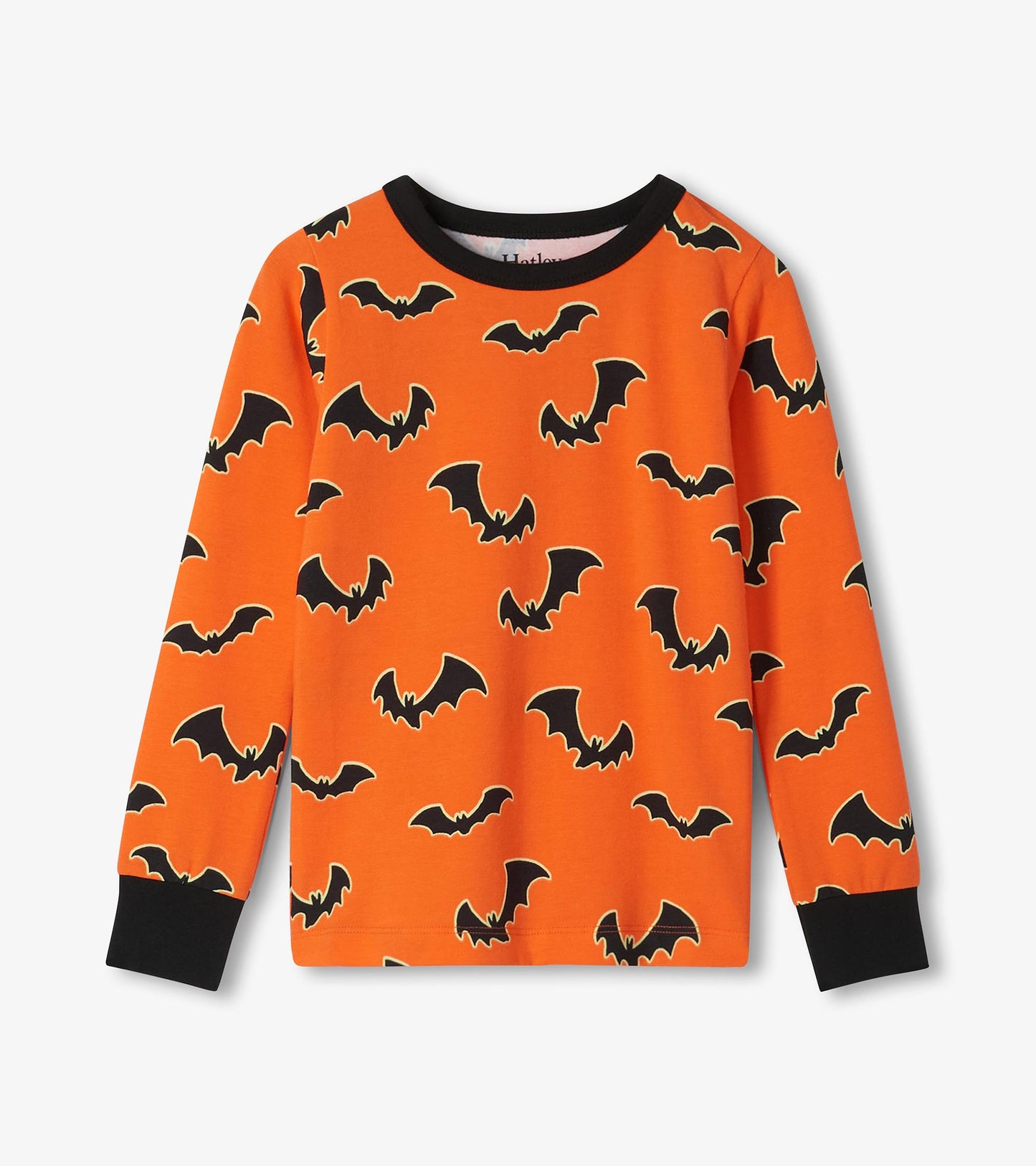 Orange long sleeve pajama top with black bat print and black neck and sleeve cuffs