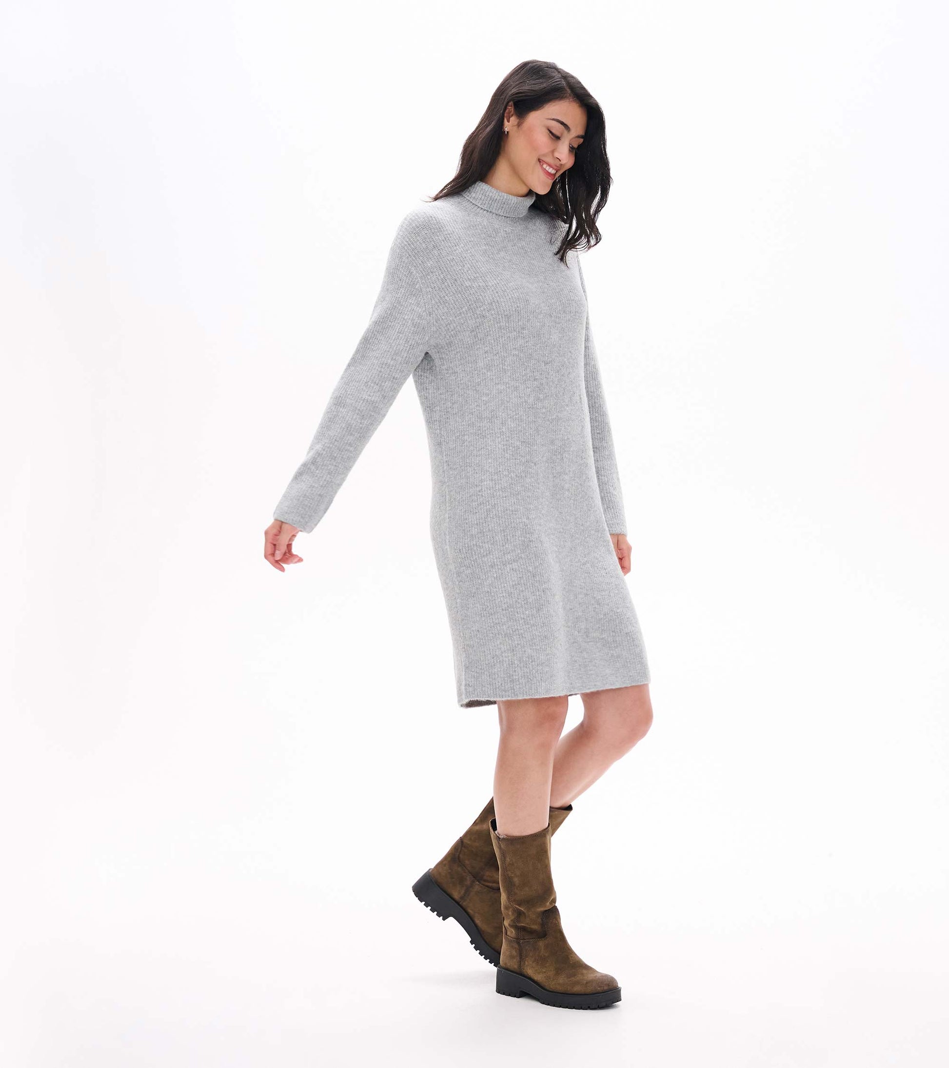 Side view of grey melange turtleneck sweater dress with long sleeves and knee-length hem