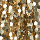 View Girls Gold Sequin Skirt Gold sequins with a reflective metallic texture