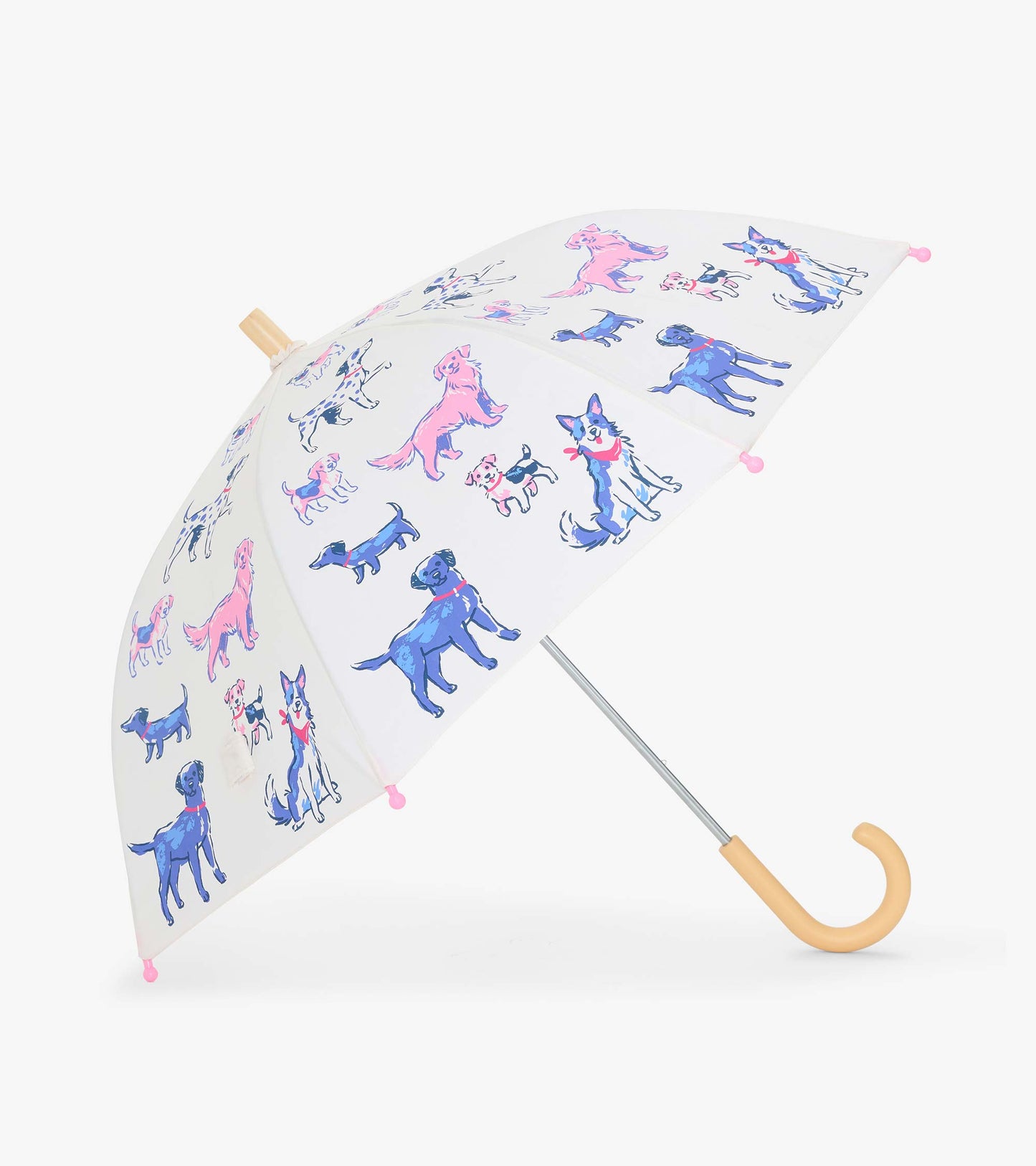Open clear kids umbrella with colorful dog print, pink tips, and curved wooden-look handle