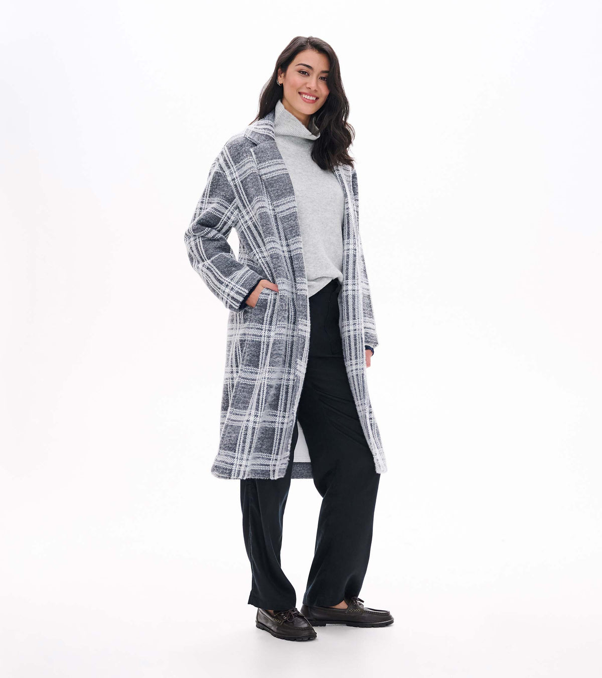 Three-quarter front view of Paxton Jacket in charcoal plaid with hand in pocket