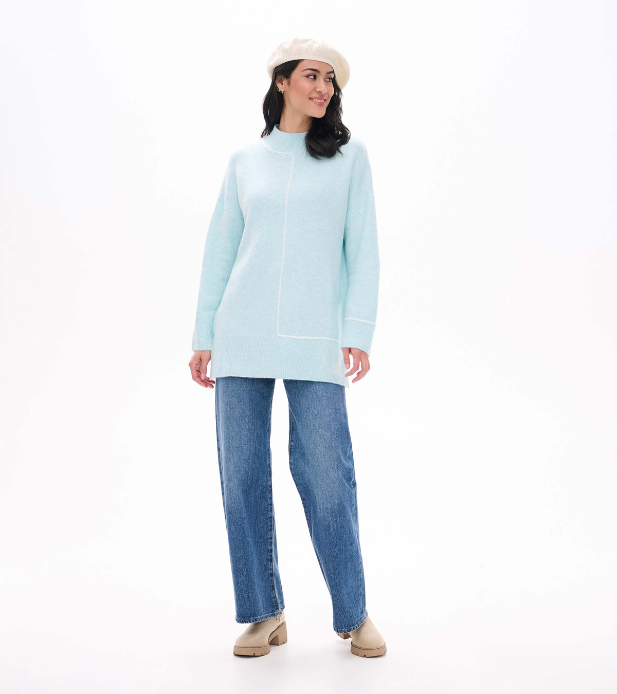 Front angled view of teal tunic sweater with mock neck and contrast line detail