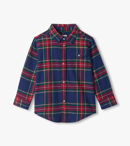 Front view of boys plaid button-down shirt in navy, red and green with snap buttons and chest flap pocket