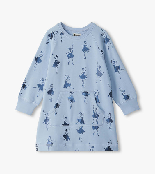 Front view of light blue sweatshirt dress with ballerina print, long raglan sleeves, ribbed cuffs, and kangaroo pocket