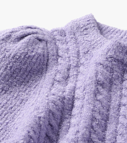 Close-up of the Emerson sweater in lilac with a textured boucle surface and folded collar detail