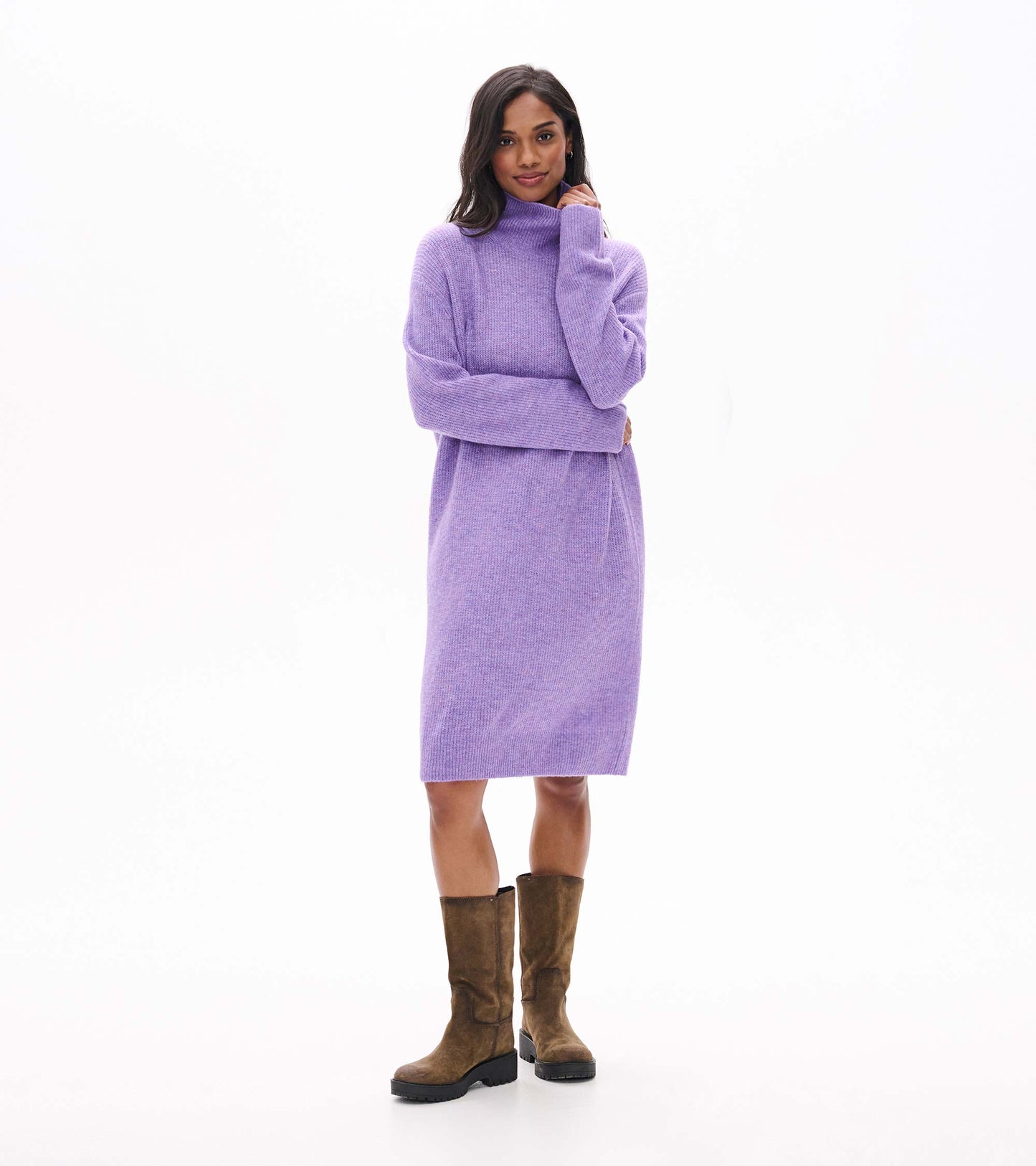 Model wearing lilac melange sweater dress with a high neck and long sleeves, front view