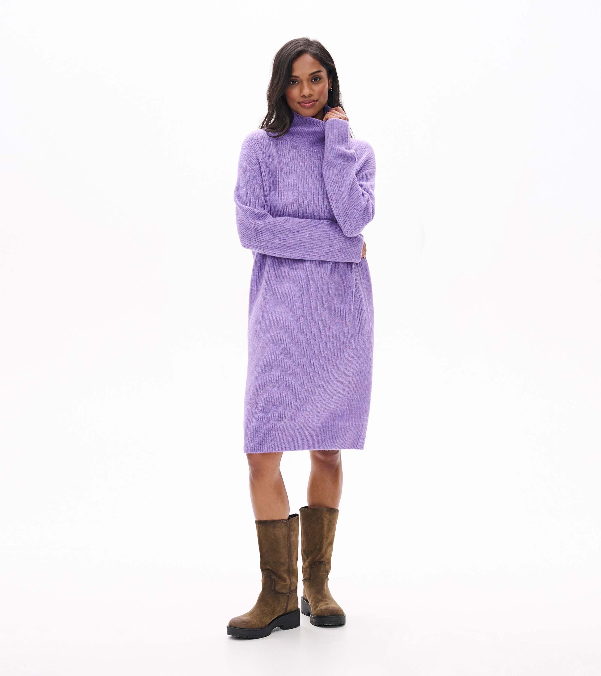 Model wearing lilac melange sweater dress with a high neck and long sleeves, front view