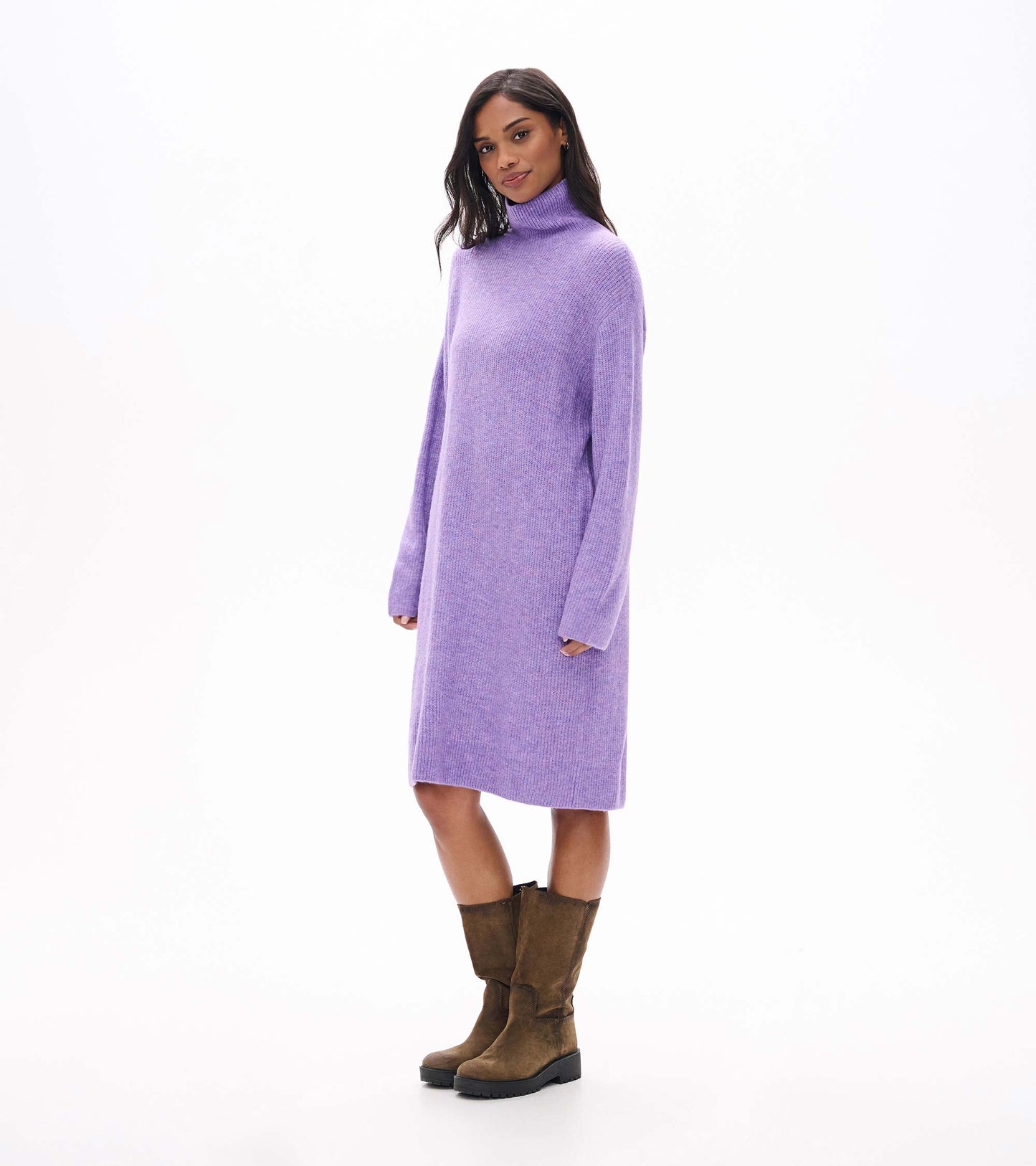 Model wearing lilac melange sweater dress with high neck and long sleeves, side front view