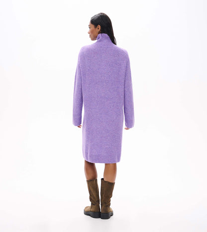 Back view of lilac melange sweater dress with a high neck, long sleeves, and knee-length straight fit