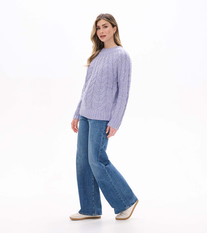 Side front view of Dylan Sweater in speckle lilac showing cable knit texture and relaxed fit