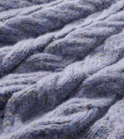 Close-up of the speckle lilac cable-knit sweater texture with multicolor flecks