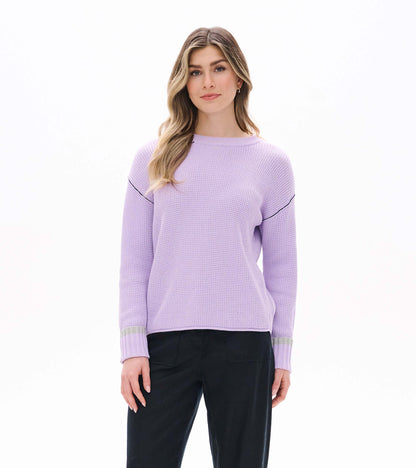 Front view of lilac waffle knit sweater with drop shoulders, crew neck, and contrast cuff bands