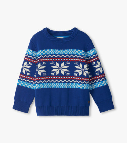 Front view of boys blue crew neck sweater with white snowflakes and red, white, and teal Fair Isle bands
