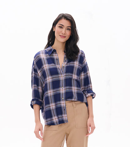 Close front view of relaxed navy plaid button-down shirt with collar, buttons, and rolled sleeves