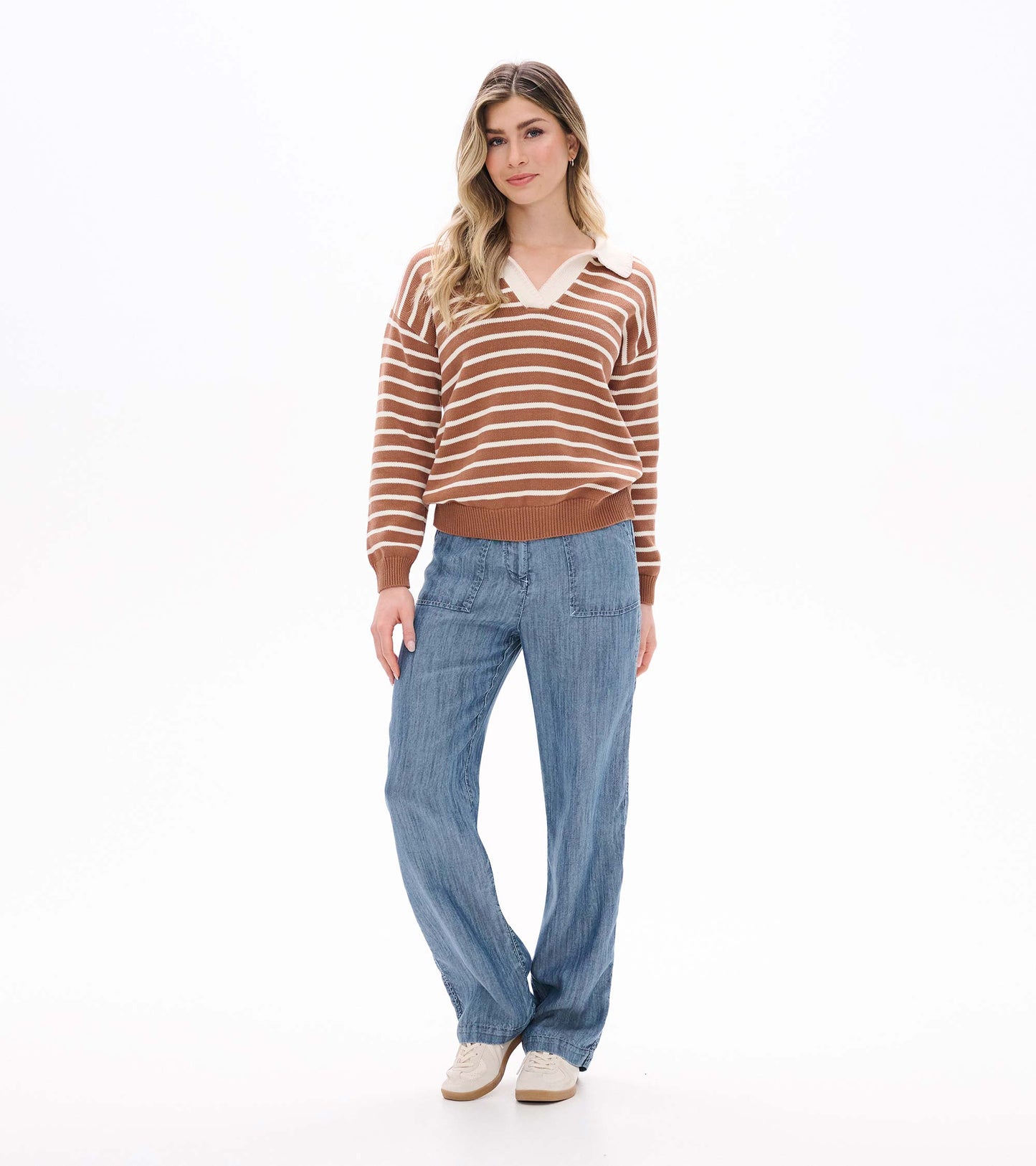 Full front view of camel and cream striped Johnny collar sweater on model