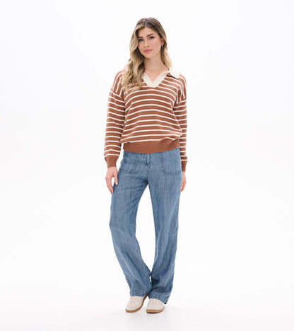 Full front view of camel and cream striped Johnny collar sweater on model