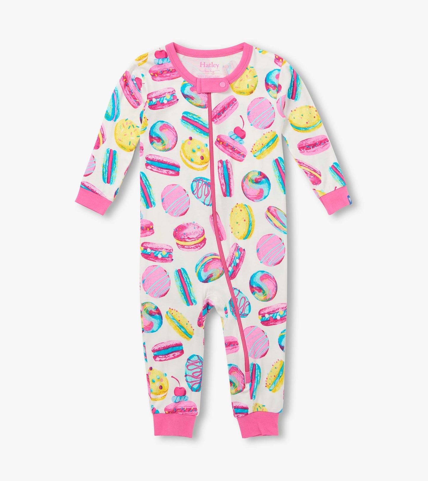 Front view of infant coverall with pink trim, zip front, and colorful macaron and pastry print