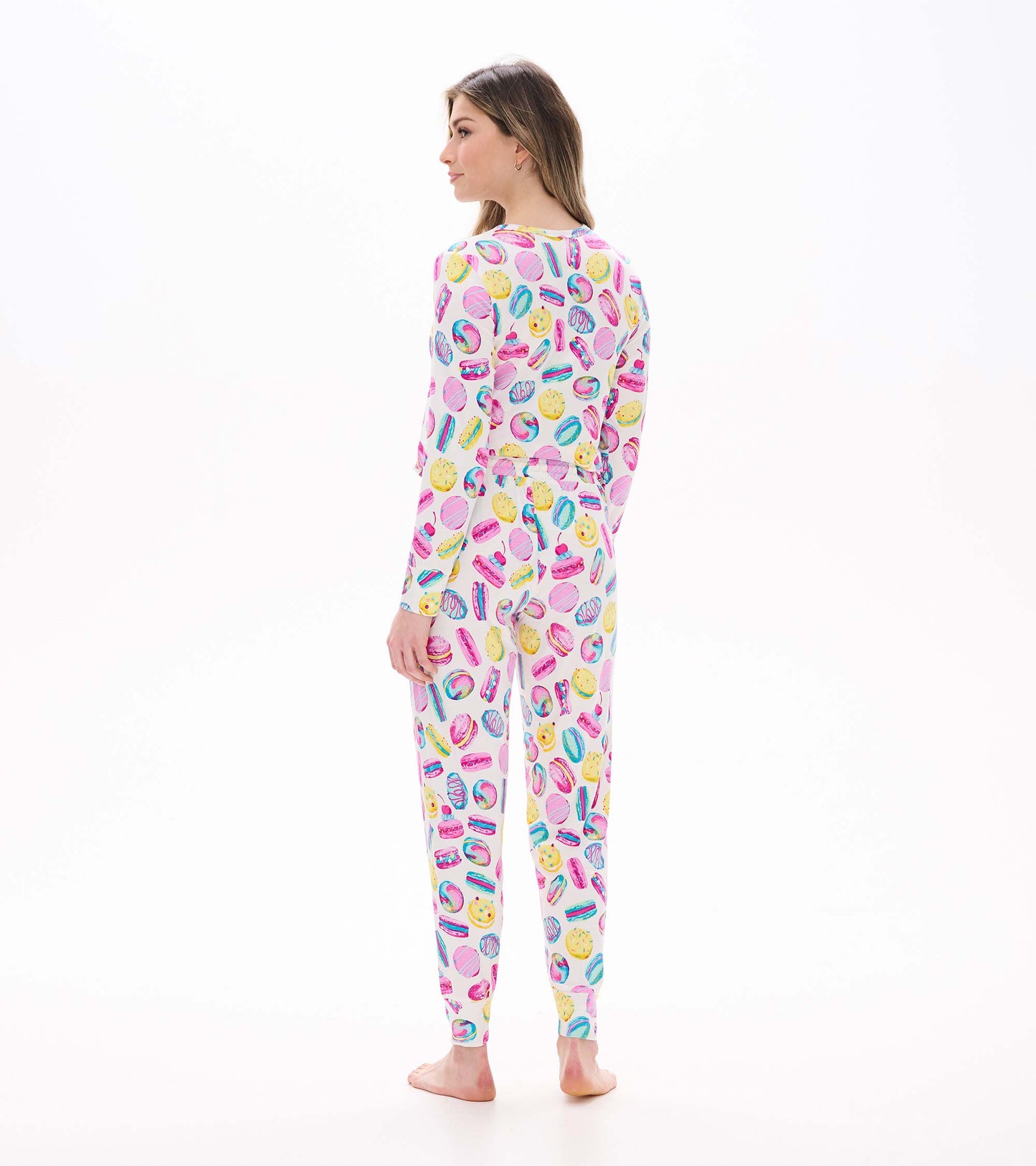 Women's pajama set with colorful macaron and pastry print, back view with long sleeves and fitted cuffs