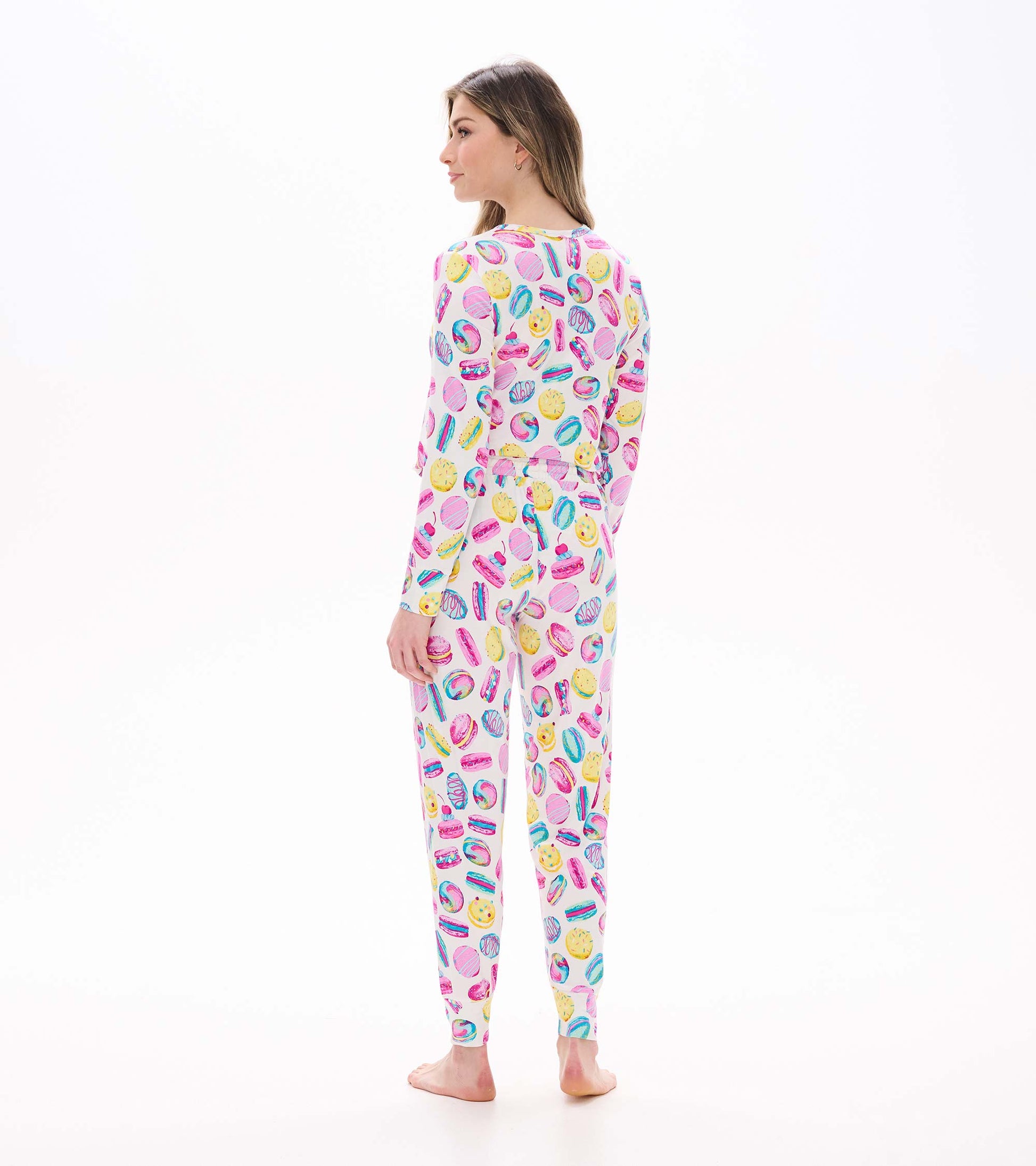 Women's pajama set with colorful macaron and pastry print, back view with long sleeves and fitted cuffs
