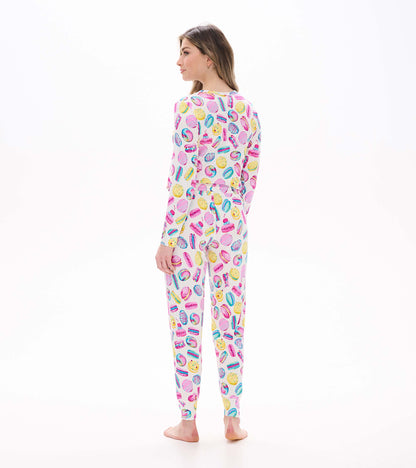 Women's pajama set with colorful macaron and pastry print, back view with long sleeves and fitted cuffs