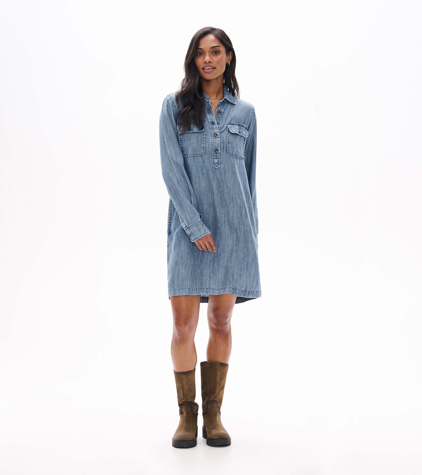 Front view of blue acid rinse popover dress with collar, partial button placket, and two chest flap pockets