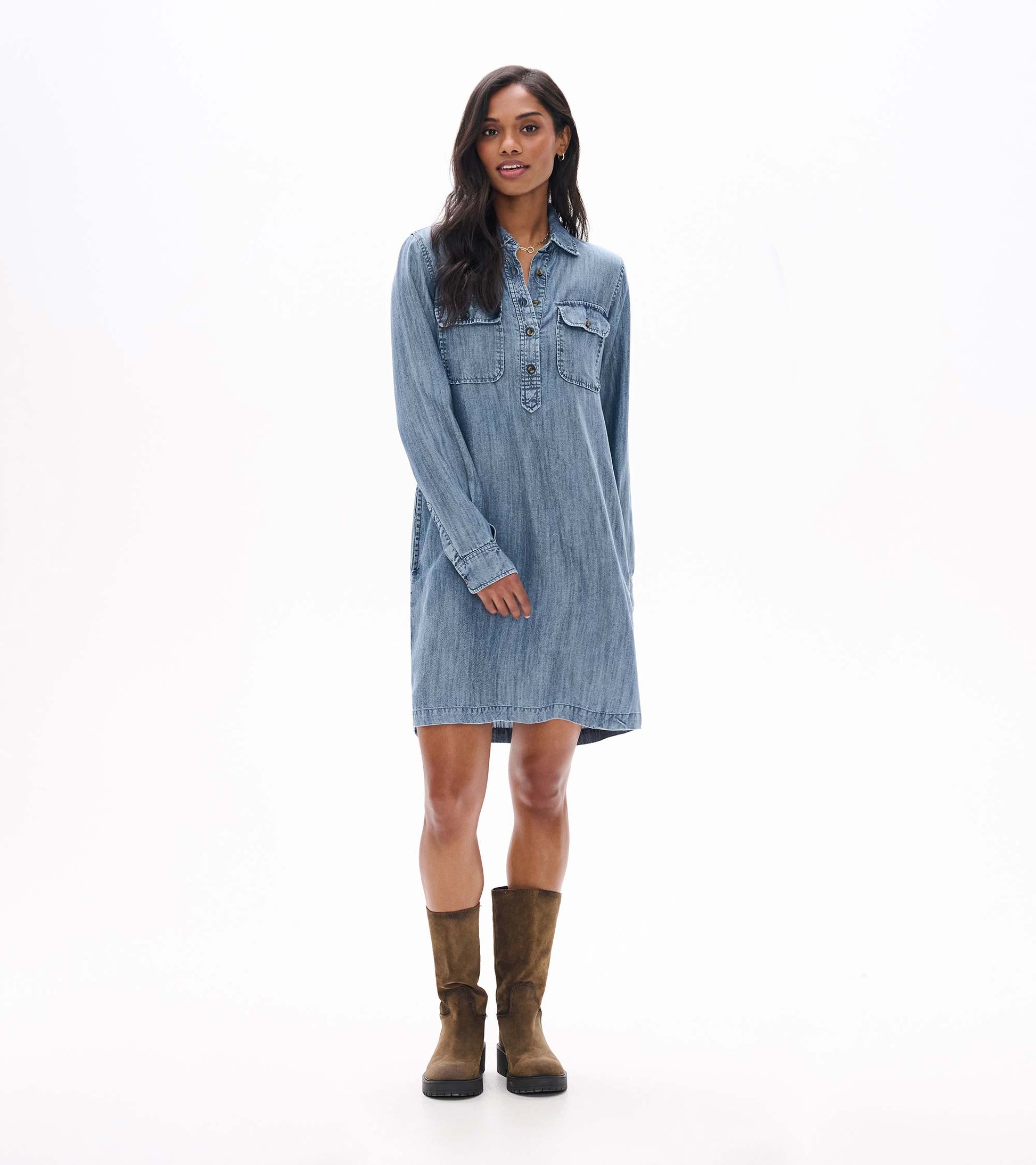 Front view of blue acid rinse popover dress with collar, partial button placket, and two chest flap pockets