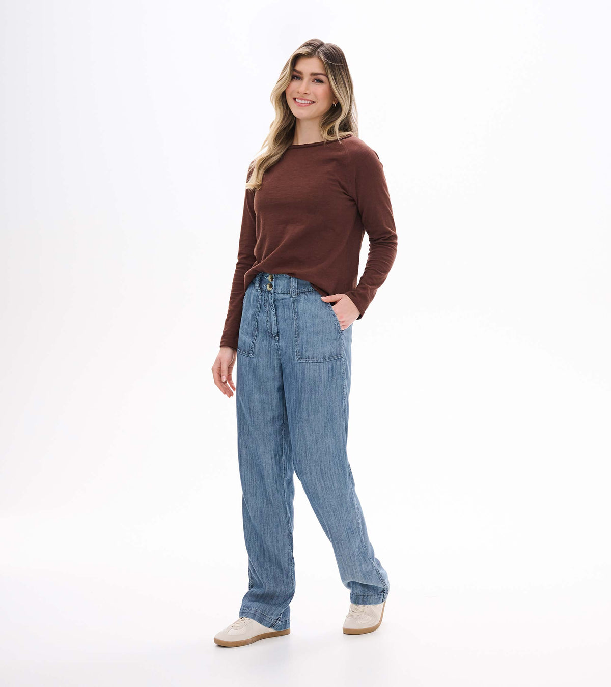 Front angled view of blue acid rinse wide leg pants with high waist and wide legs