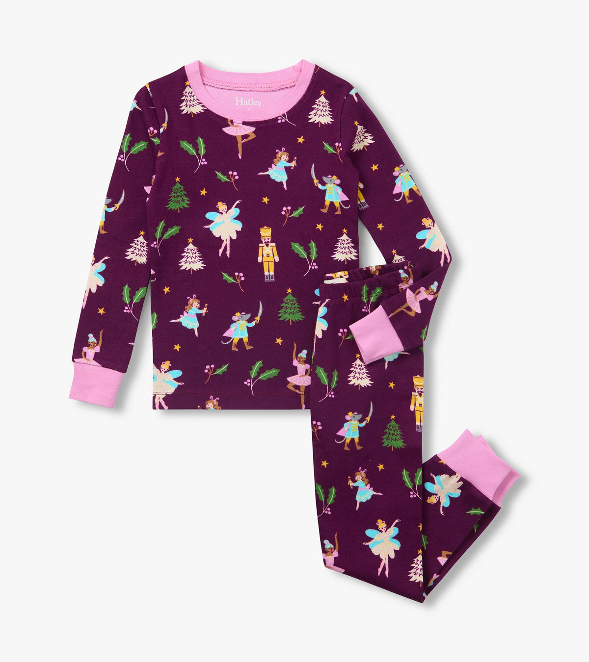Girls two-piece purple pajama set with pink cuffs and Nutcracker print featuring ballerinas, toy soldiers and holly