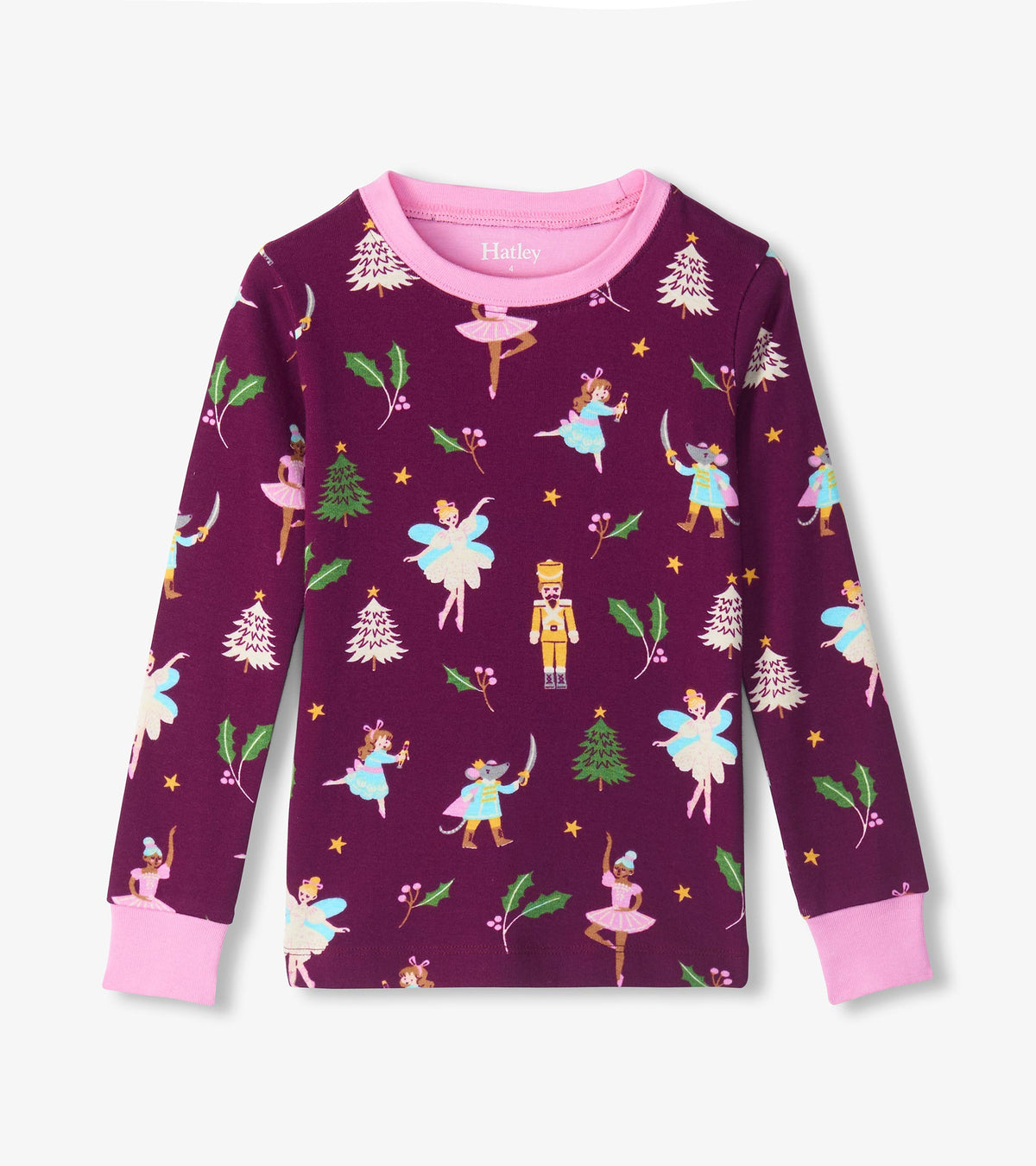 Girls purple pajama top with pink trim and Nutcracker print of ballerinas, toy soldiers, trees and holly