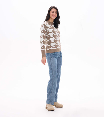 Side view of oatmeal and cream herringbone sweater with crew neck and ribbed hem