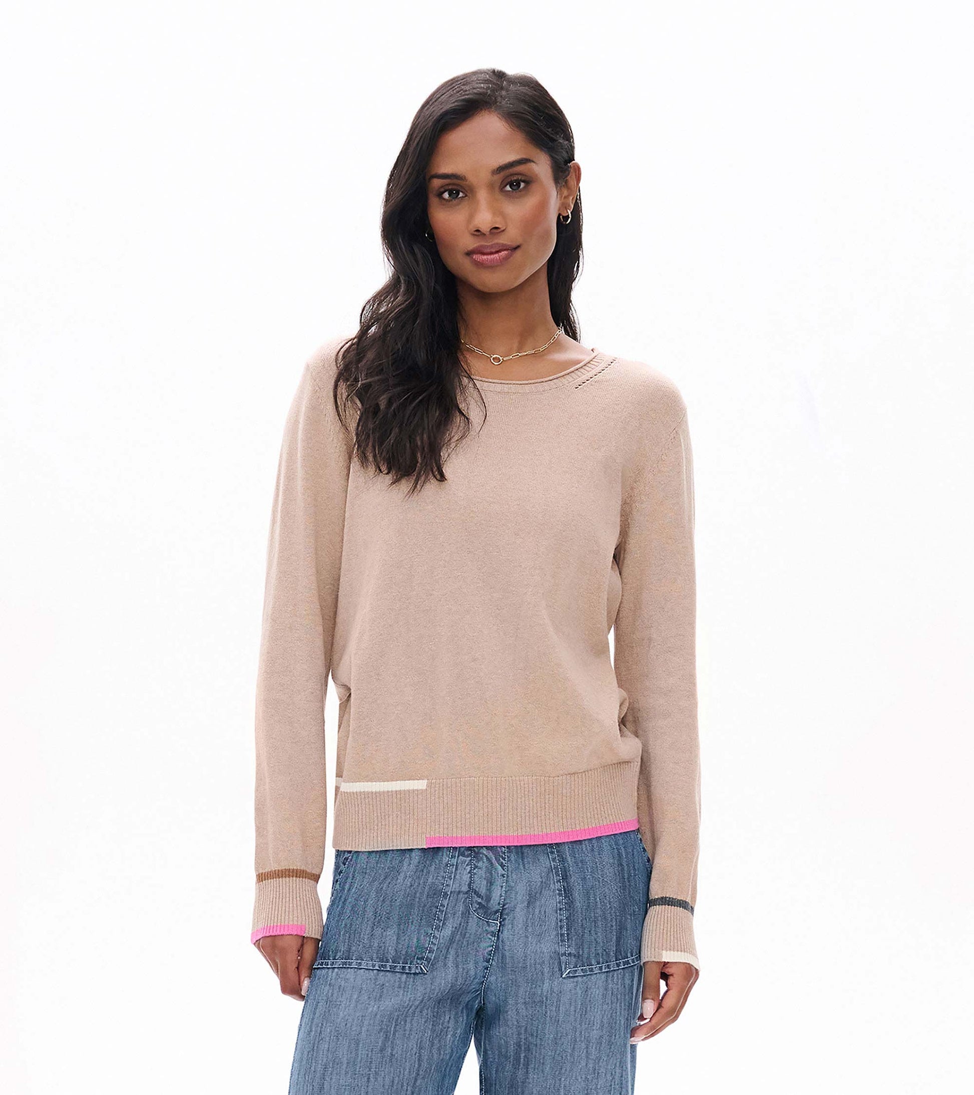 Front view of oatmeal crew neck sweater with long sleeves and pink, cream, tan, and gray trim accents