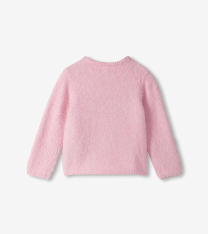 Back view of a pink furry toddler sweater with long sleeves and ribbed trim