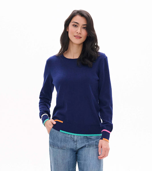 Front view of patriot blue crew neck sweater with colorful trim at cuffs and hem