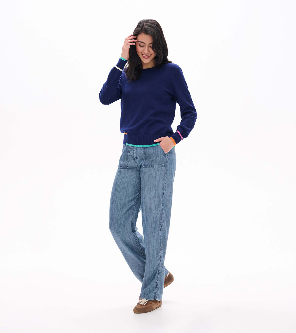 Angled front view of patriot blue crew neck sweater with multicolor cuff and hem details