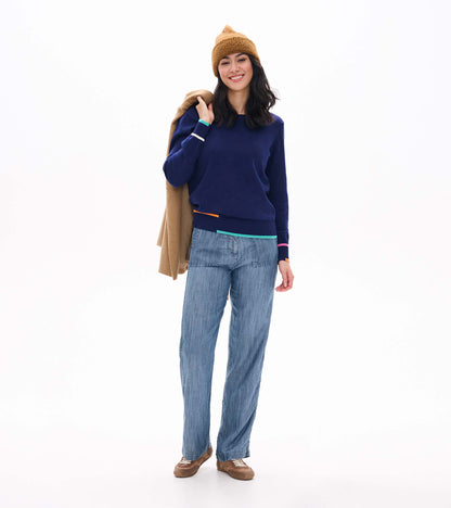 Front view of patriot blue crew neck sweater with multicolor trim at cuffs and hem