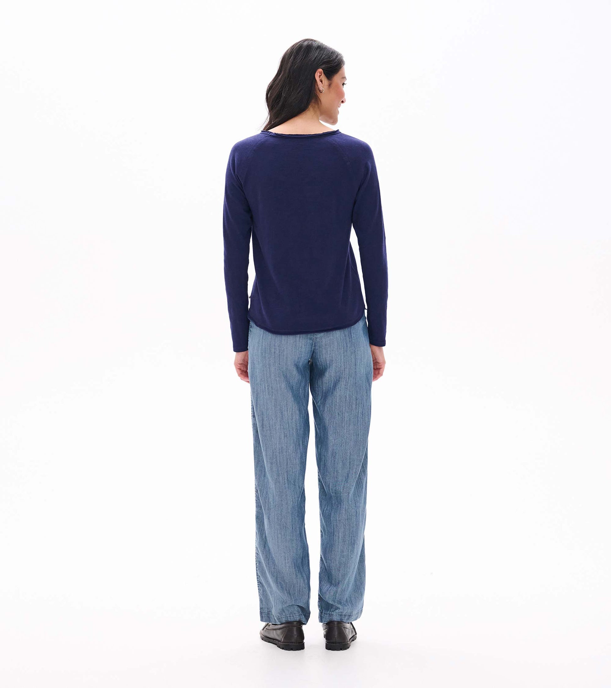 Back view of patriot blue raglan sleeve tee with long sleeves and a curved hem