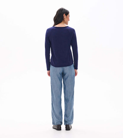 Back view of patriot blue raglan sleeve tee with long sleeves and a curved hem