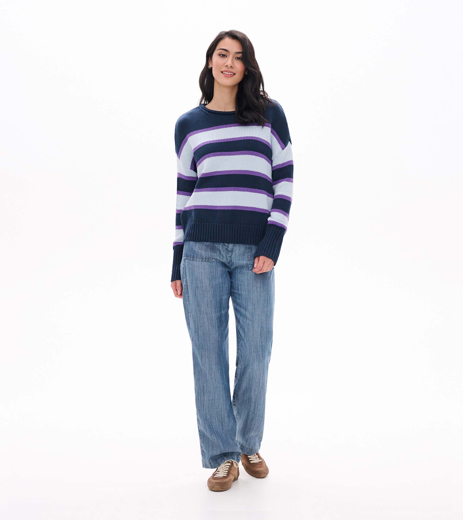 Front view of rolled collar sweater with navy, white, and purple stripes and ribbed hem and cuffs