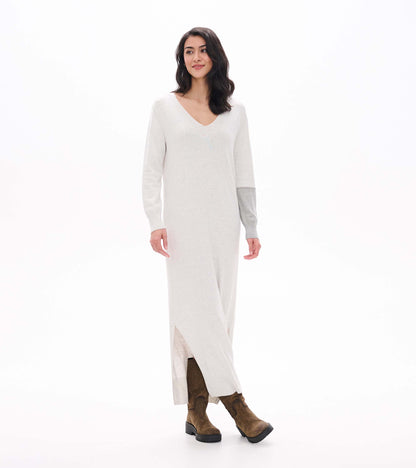 Angled front view of pale grey melange maxi sweater dress with V-neck and side slit