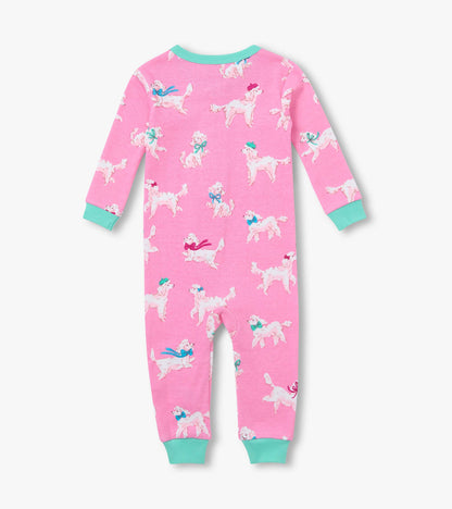 Back view of pink infant coverall with white poodle print, aqua neck trim and cuffs, and long sleeves
