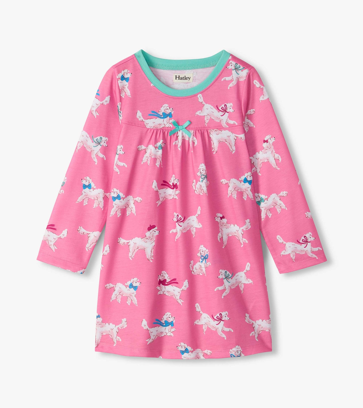 Pink long-sleeve nightdress with white poodle print, aqua neckline, and small bow at the chest